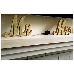 Mr & Mrs glittery gold wooden letters.